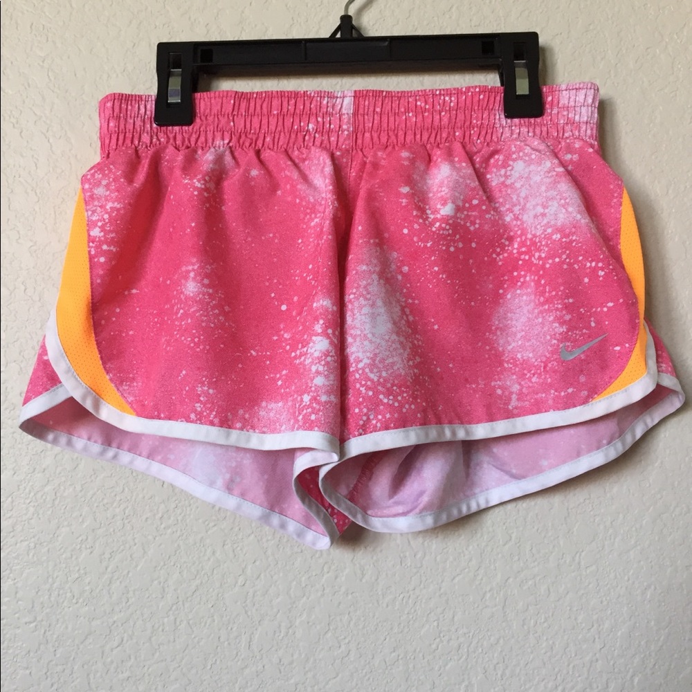 Orange, white, and pink nike shorts